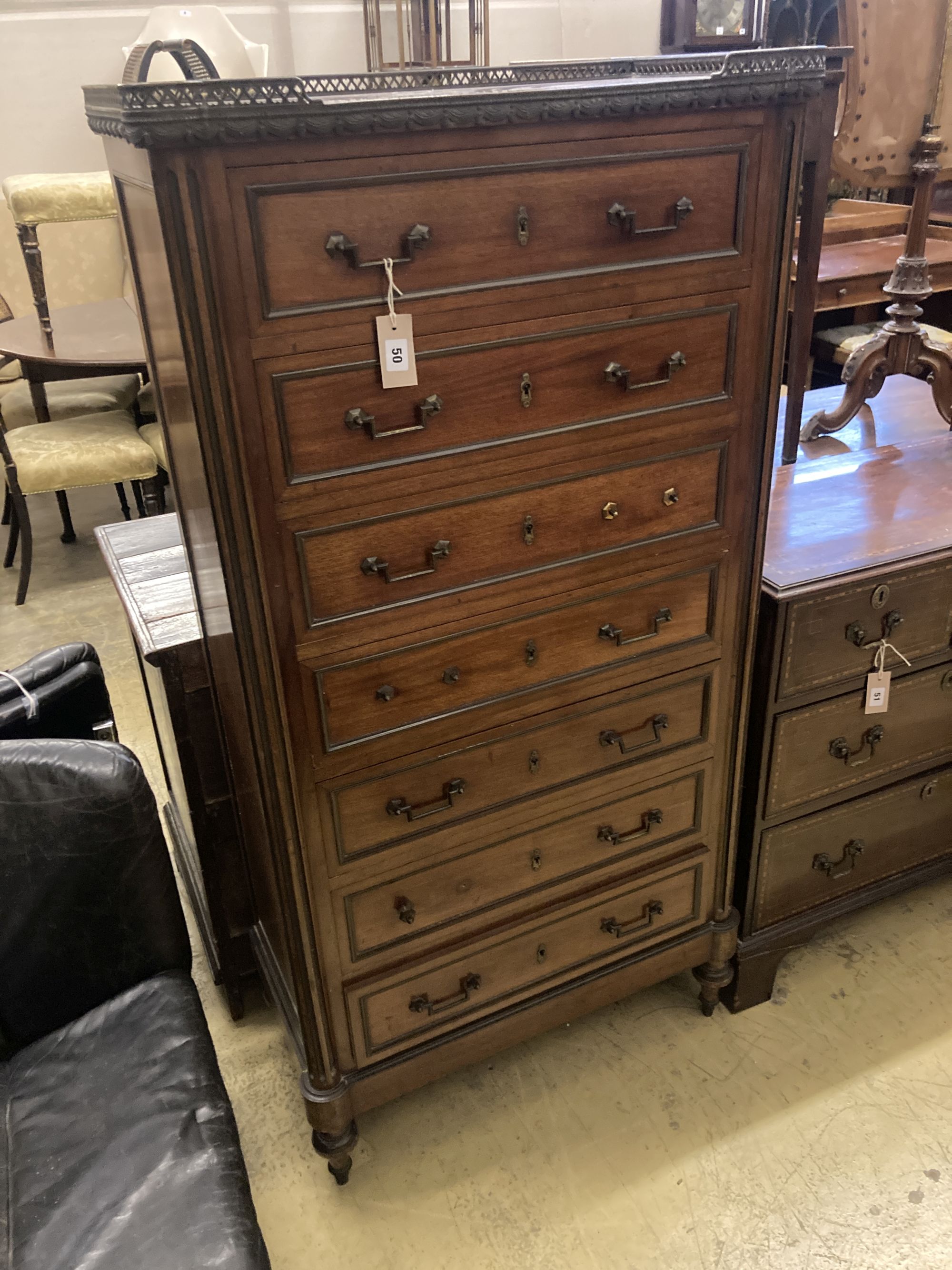 A late 19th century French marble topped mahogany semanier, width 74cm depth 38cm height 146cm